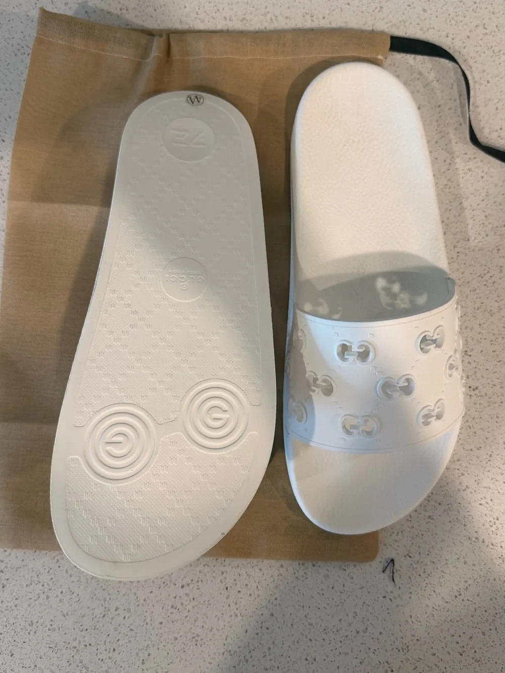 Gucci White Embossed Interlocking G Slide Sandals